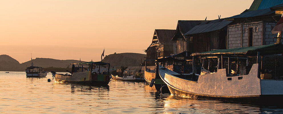 An evening view of boats docked in Flores