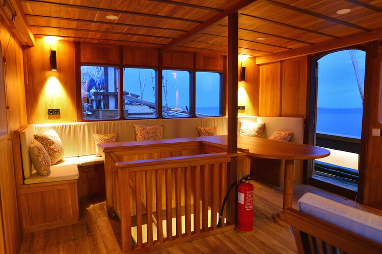 A comfy lounge inside Leyla liveaboard | Hello Flores