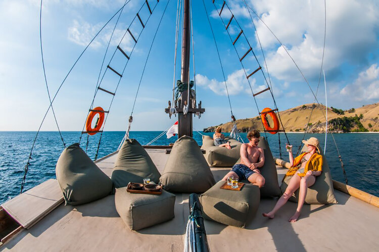 The guests are lazing around in the bean bags on Nataraja liveaboard